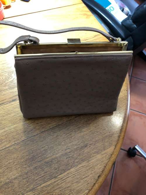 Genuine ostrich skin handbag in brown
